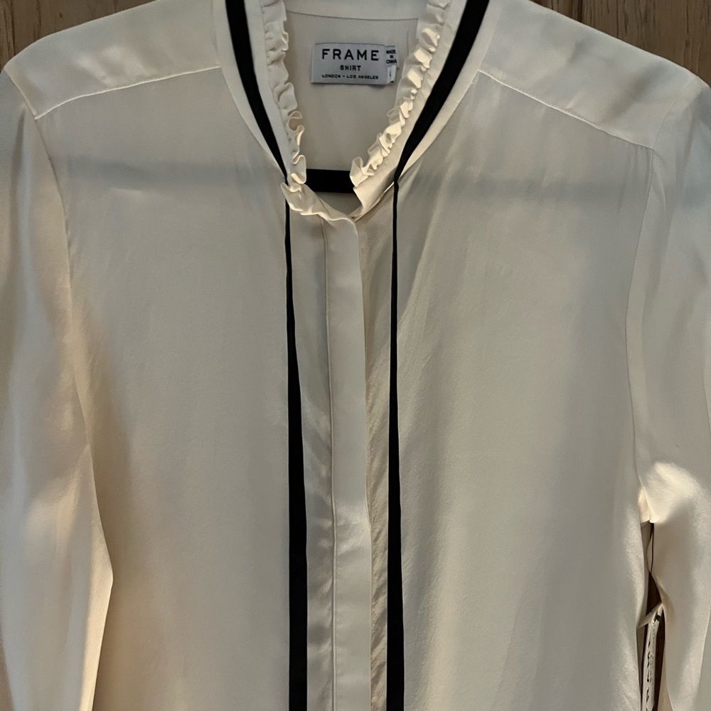 Frame silk blouse large. Winter white with black silk tie.